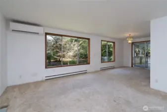 Living room and dining (upstairs). Ductless mini-split provides efficient heating and cooling.