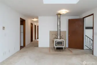 Additional heat supplied by wood stove.