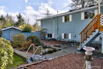 Another view of side yard. Formerly had a pool in this area.