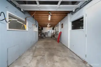 Second bay of shop space. There is also a winch to raise and lower items into loft area.