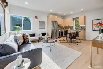 Main level open concept living and kitchen area.