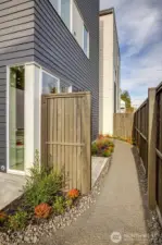 Vertical corner windows summon light. All the homes have air conditioning and efficient, high-end systems.