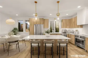 Bellmont cabinetry, Calacatta quartz, and Bosch appliances with a 36” induction range.