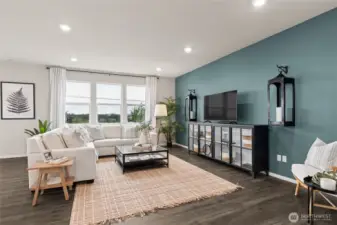 Large family room with picturesque windows. Photos are for representational purposes only.  Colors and finishes may vary.