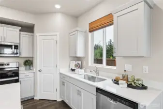 Who doesn't like a window behind your kitchen sink. Photos are for representational purposes only.  Colors and finishes may vary.