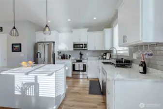 Bright, cheerful kitchen is well-appointed to meet all of your needs.