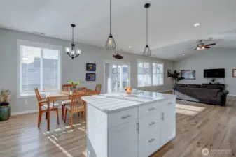 This kitchen island offers prep space, storage and a breakfast bar.