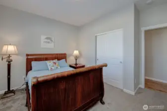 Guest bedroom #1 has cozy carpet flooring and lots of room to spare...