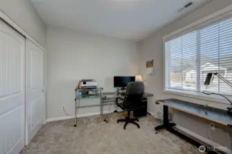 Guest bedroom #2 currently used as a large office.