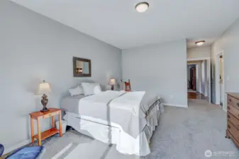 Primary suite includes an oversized walk-in closet and attached 4-piece bathroom.
