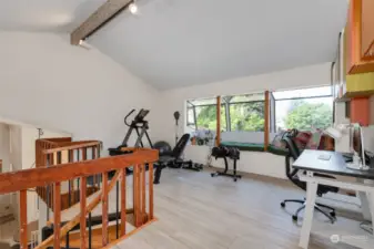 Loft for office, exercise, hobbies with window reading nook