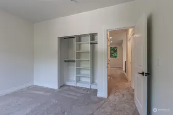 All bedrooms feature large custom closets