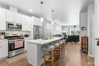 Gorgeous kitchen with stainless appliances.