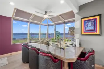Sunny corner bar/mini kitchen is fully equipped in the game room. Skylights with shades. Imagine the sunset!