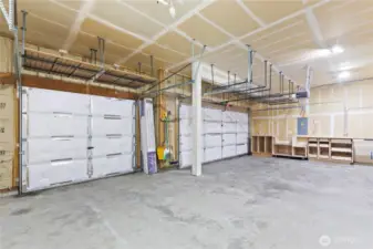 Huge 3-car garage with a workshop area,