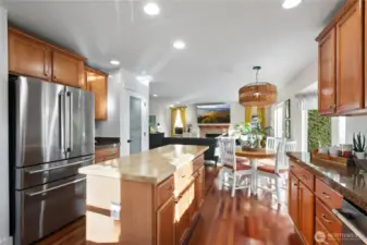 Big kitchen with upscale appliances, granite countertops, and island.