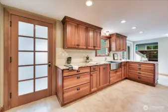 Door to laundry and exit to garage (left)