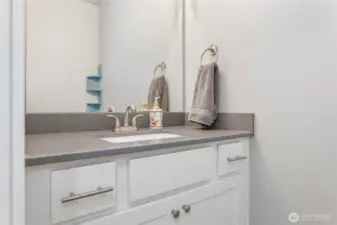 Main floor guest half bath.