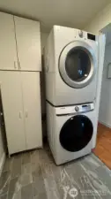 Newer full size washer & dryer with multiple storage cabinets