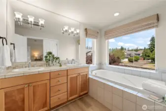 Primary suite vanity and tub