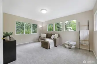 Extra big bonus room with surrounding windows & French doors—flexible 6th bedroom, game room or home theater.