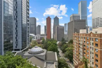 Picture-perfect blend of city architecture, water view and lush greenery from your window.