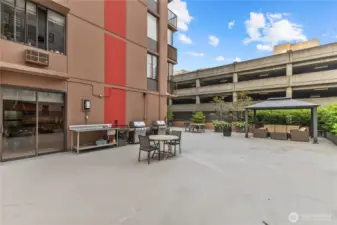 Multiple grills and dining spaces for outdoor meals and entertaining.