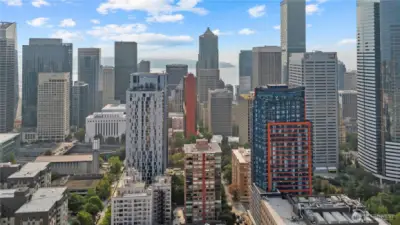 Aerial perspective capturing the skyline with glimpses of Seattle’s stadium district.