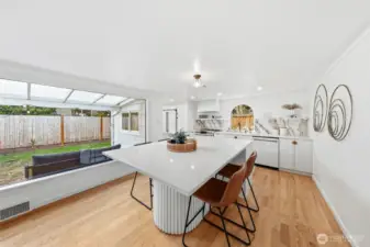 Large picture window looks out at the front yard