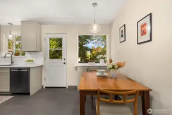 Breakfast nook overlooking backyard gardens.