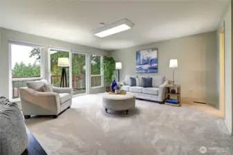 A spacious main-level flex room with powder bath offers endless possibilities—guest space, home office, or additional bedroom.