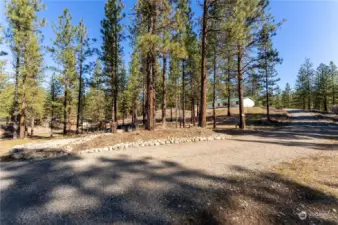 2 RV parking areas for your friends and guests each Summer have access to Power, Water and RV Dump. Access from 23 Chokecherry private driveway. Graveled and landscaped.
