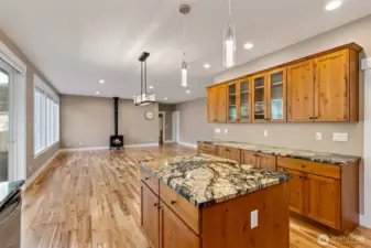 Propane fireplace warms this versatile great room.