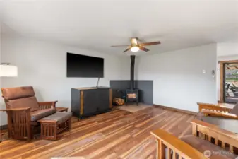 An inviting flow from the living area and the big slider door draws you to the dining and kitchen areas.