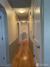 Hallway with crown custom lighting