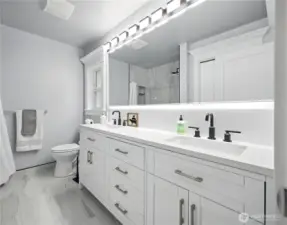 Double vanity w/quarts counters & in cabinet plugs