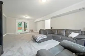 Another angle of the family room with fench doors to covered back patio