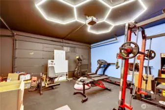 Two car garage is currently a workout room.