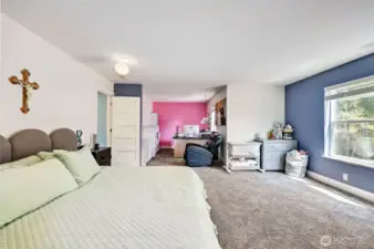 Primary Suite has extra space that is currently used as an office.