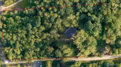 Gravel pit on the right corner of property line, can fit multiple cars or additional storage unit.