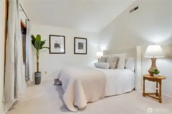 Retreat to the primary suite with its refreshed bath and a private balcony overlooking the view.