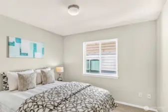 Secondary bedroom with new carpet and paint for a crisp start. Quiet outlooks and a standard closet make it a comfortable space for guests, a nursery, or a focused home office.