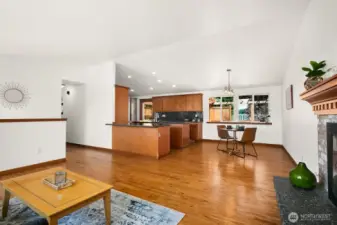 Open concept living space to kitchen