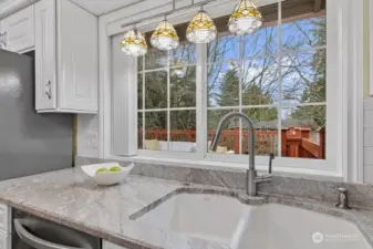 Beautiful views to backyard overlooking deck