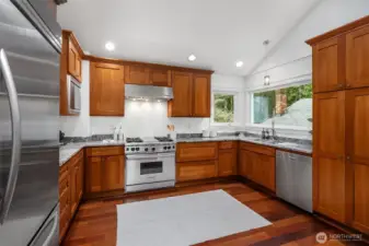 Updated kitchen with granite countertops.
