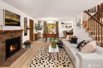 A gas brick-surround fireplace is at the heart of this cozy family room.