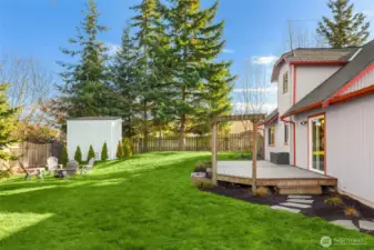 Shot of the back yard showing the 10x10 shed leased by T-Mobile.