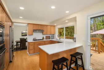 Updated kitchen with high-end stainless steel appliances.