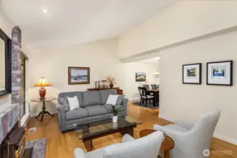 Host friends in the vaulted living area & adjacent dining room.
