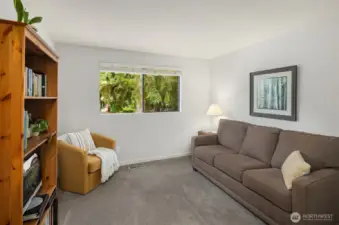 Third upstairs bedroom, currently used as a lounge.